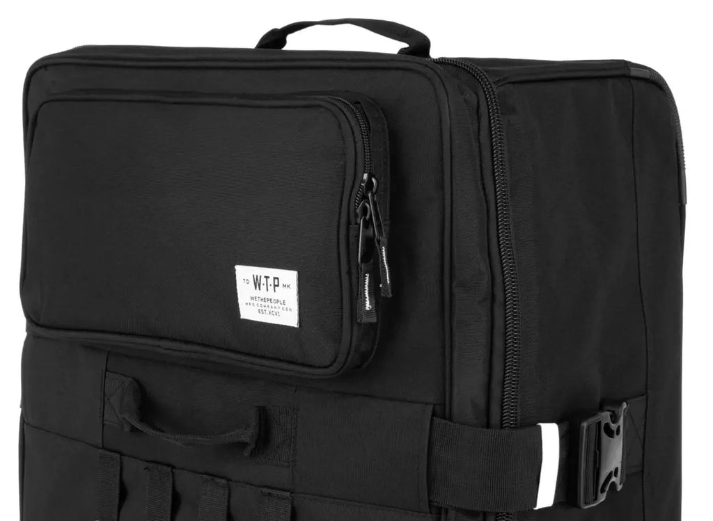 Sac de transport noir robuste avec poches zippées et logo WTP, idéal pour BMX et équipement de vélo