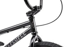 Vélo BMX noir avec guidon et fourche détaillés, cadre robuste pour tricks et freestyle