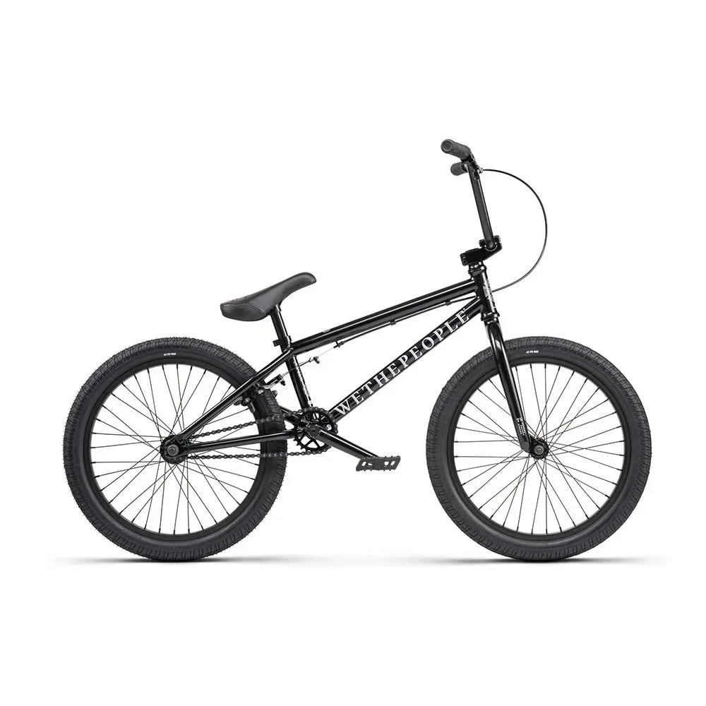 Vélo BMX noir WETHEPEOPLE, cadre robuste, pneus larges, idéal pour tricks et freestyle