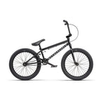 Vélo BMX noir WETHEPEOPLE, cadre robuste, pneus larges, idéal pour tricks et freestyle